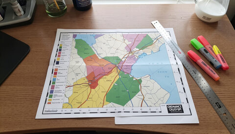 Ordnance Survey style map printed with colour-coded park catchments